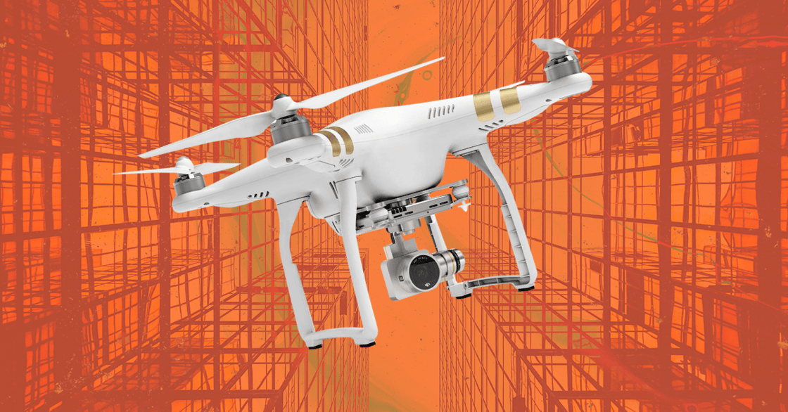 A white drone against an orange background.