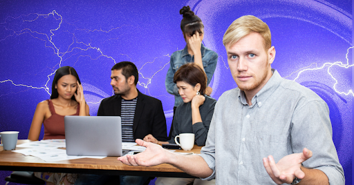 A group of unhappy adults in an office.