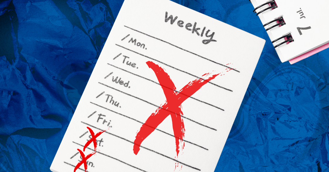 A weekly calendar with red X marks on it.