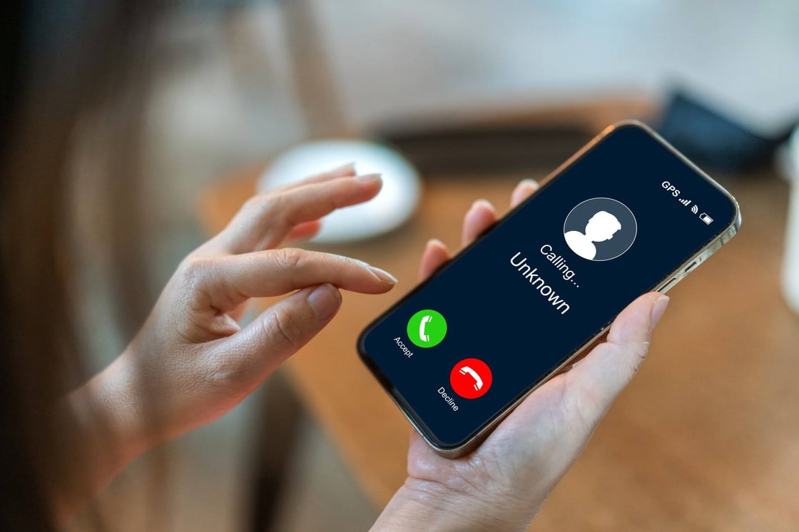 An iPhone showing a call from an unknown contact.