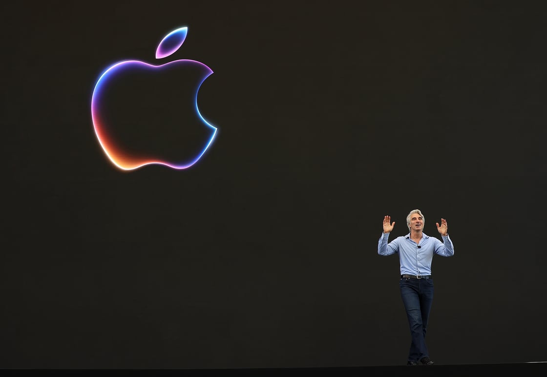 Apple senior vice president of software engineering Craig Federighi delivers remarks on stage.