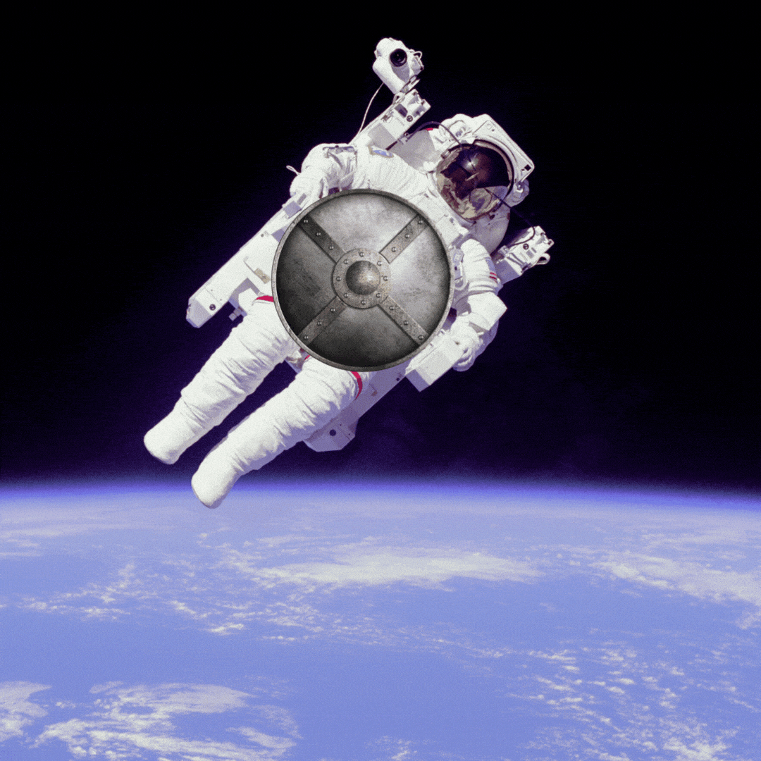 An astronaut floats about the earth. A metal shield rotates in front of their spacesuit. 