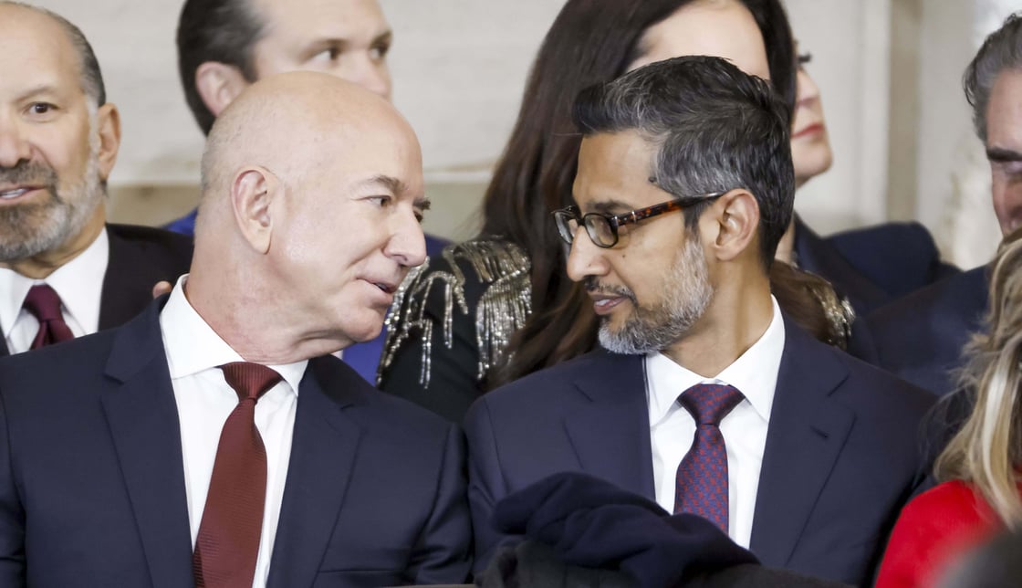 Jeff Bezos and Sundar Pichai in conversation.