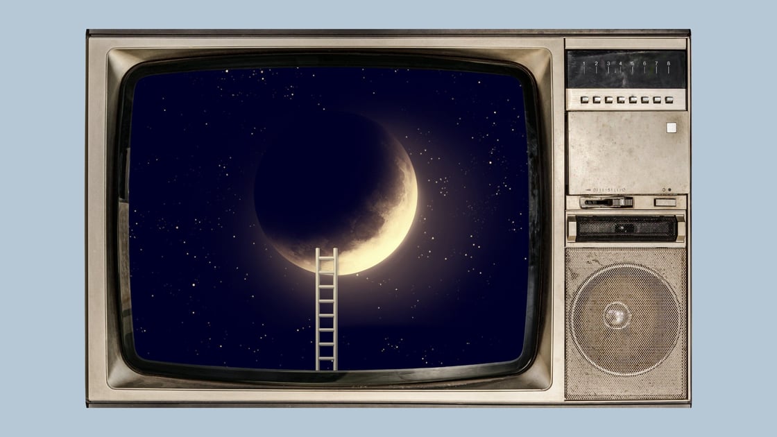 A TV set featuring an image of a ladder extending to the moon. 